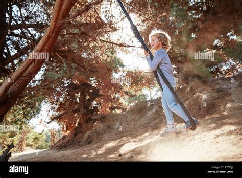 child swinging  swingset  res stock photography  images alamy