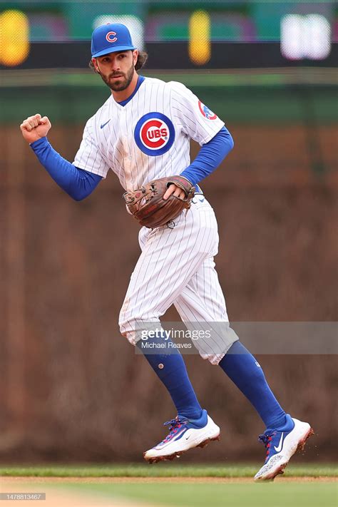Dansby swanson of the chicago cubs celebrates a double play during