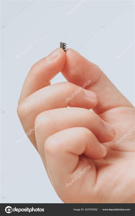 small black chip holds childrens hand chipization people epidemic