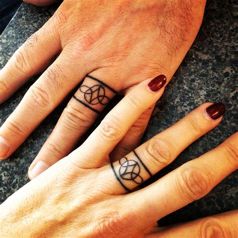 wedding band finger tattoos 9