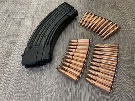 Комплект: Магазин АК / АКМ 7.62х39, десантный + 30 патронов омедненных ...