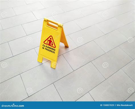 Cleaning in progress sign stock image. Image of yellow - 150857029