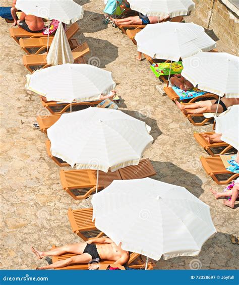 sunbath   beach editorial photography image  caucasian