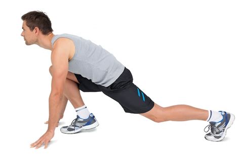 premium photo side view   young man  ready  run posture