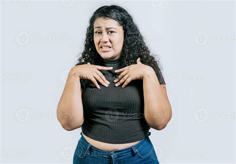 Young woman disgusted face isolated. Displeased young woman frowning on