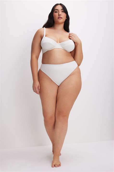 Bikinis and one-piece swimsuits for a warm getaway: SKIMS, Old Navy