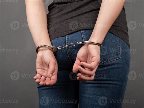 arrested girl in handcuffs, woman convicted of a crime 4603101 Stock