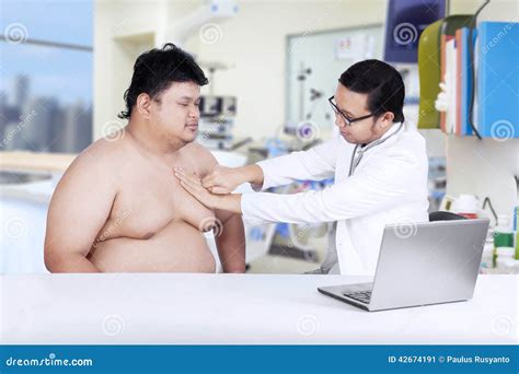 Fat man check up to doctor stock image. Image of illness - 42674191