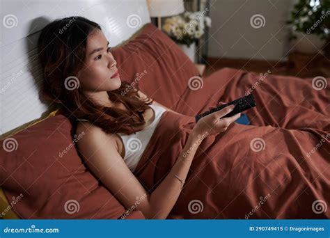 Sad Woman Watching TV Show stock image. Image of movie - 290749415