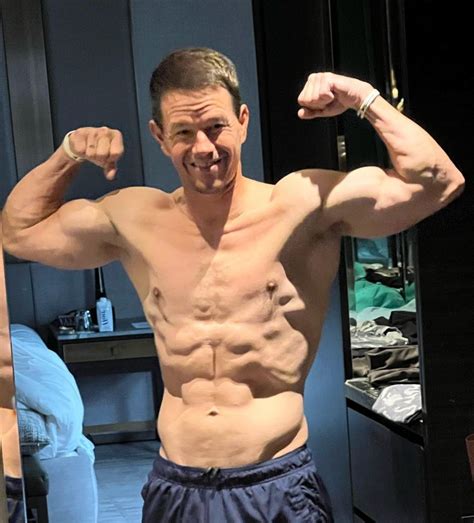 mark wahlberg shows   shredded  pack  shirtless photo