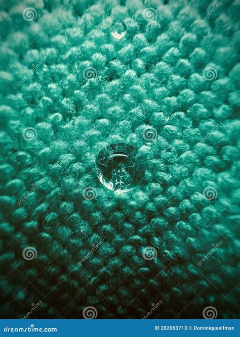 Water Drop in a Green Towel Stock Image - Image of underwater, drop
