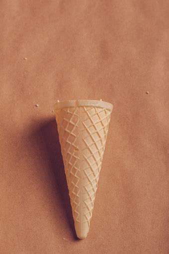 single crispy ice cream cone stock photo  image  beige