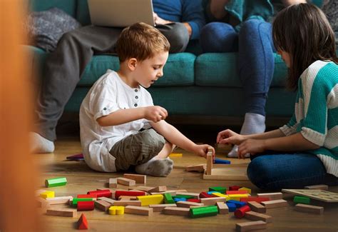 boy  fun  playing wooden toy drum royalty  photo
