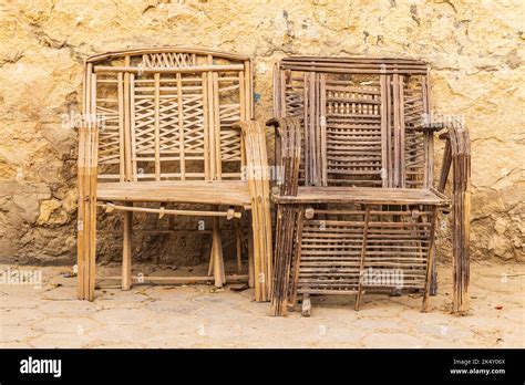 Faiyum, Egypt. Old wicker chairs in the village of Faiyum Stock Photo