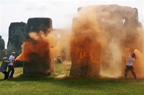 climate activists paint stonehenge orange  read alaska
