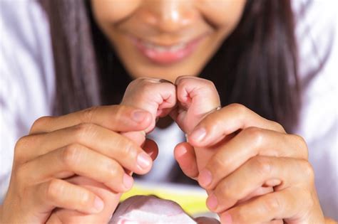 Premium Photo | Hands of newborn baby