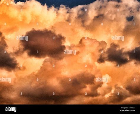 Dramatic clouds at sunset Stock Photo - Alamy