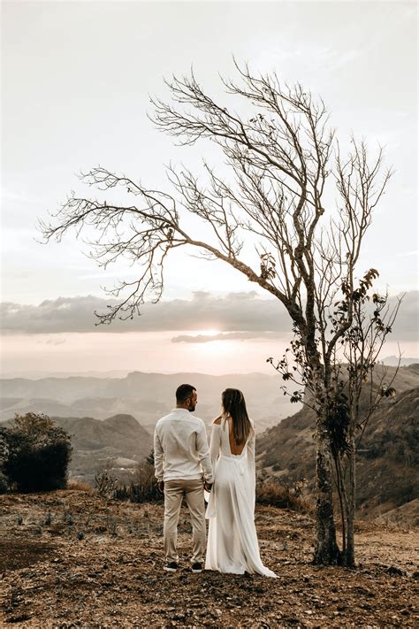 Download Romantic Couple Prenup On Barren Mountain Wallpaper