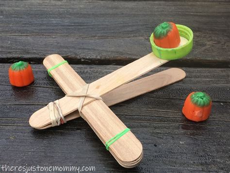 Craft Stick Pumpkin Catapult | There's Just One Mommy