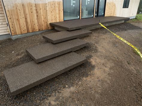 concrete medallion and flagstone patio | Decorative Concrete including