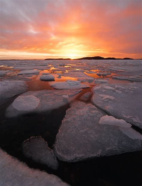 Ice floes & burning sky, Southwest Finland [3848x5035][OC] : r/EarthPorn