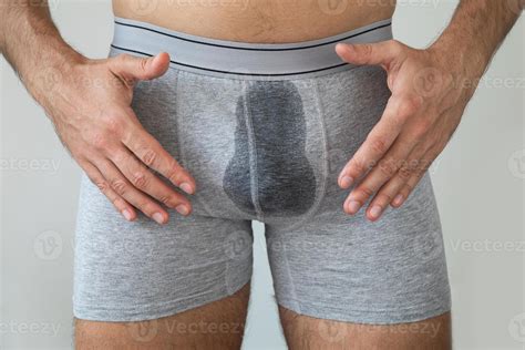 Man with wet briefs because of urinary incontinence 16252727 Stock Photo at Vecteezy