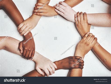 cultures holding hands