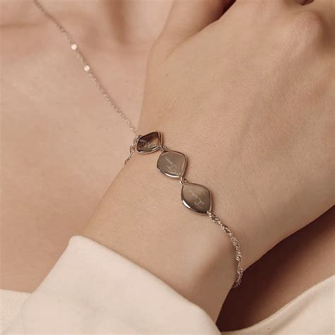 The Viral Family Name Bracelet - Why Everyone's Wearing One and Why You ...