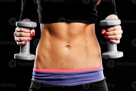 Muscular female belly 15886628 Stock Photo at Vecteezy