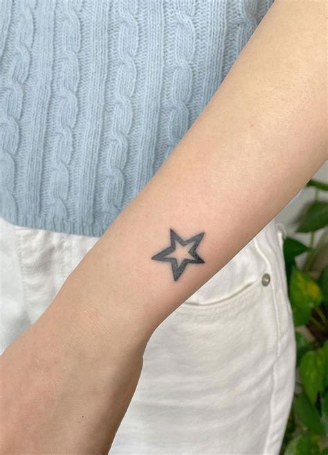 Celestial Charms 20+ Star Tattoo Designs : A Star on Arm I Take You ...