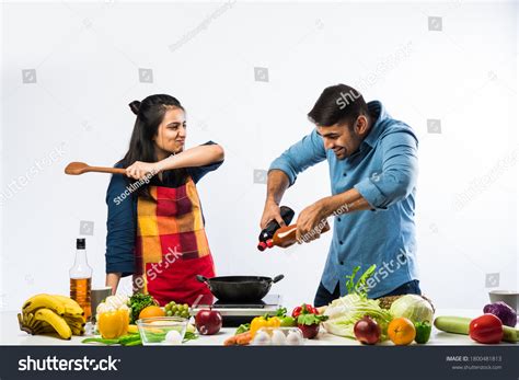 573 Indian Male Female Cooking Images, Stock Photos & Vectors