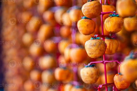 Hanged vietnamese persimmons, traditional food - Dried persimmons in