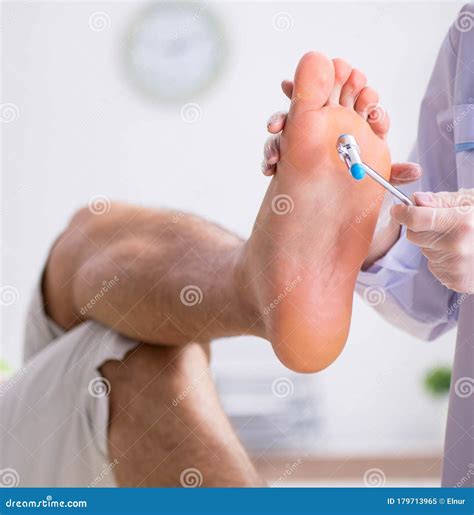 Podiatrist Treating Feet during Procedure Stock Image - Image of