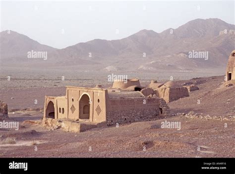 Desert landscape with Zoroastrian house ruins and mountains, Shiraz ...