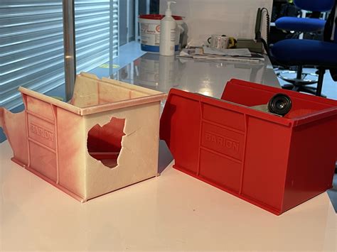 UV damage on a red plastic box sat in a window for 15+ years, vs one