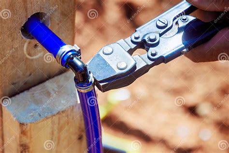 During Installation of Water Piping System, Plumber Connects a Blue PVC ...