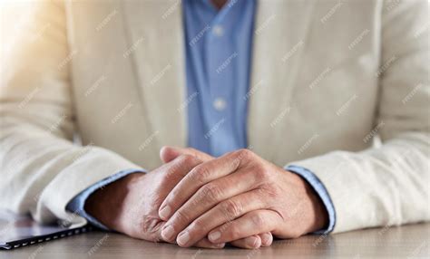 premium photo business person hands   patience  desk