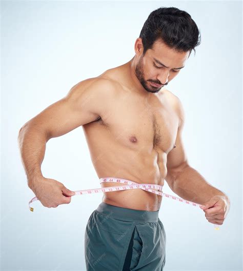Man body or measuring tape on waist on studio background for weight