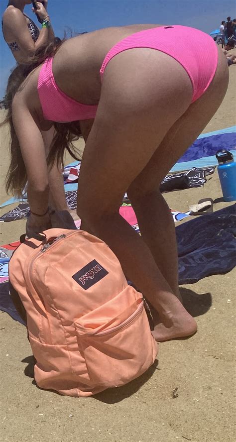 Blonde college girl bending over in bikini plus others - Beach & Bikini
