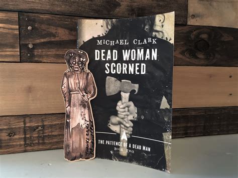 [Book Review] Dead Woman Scorned by Michael Clark - Erica Robyn Reads