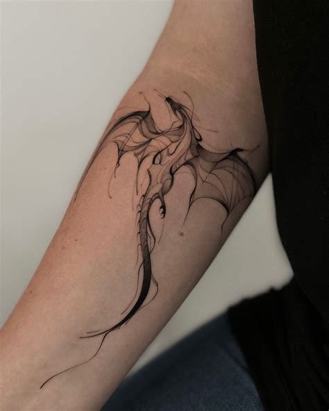 dragon tattoo on forearm 11