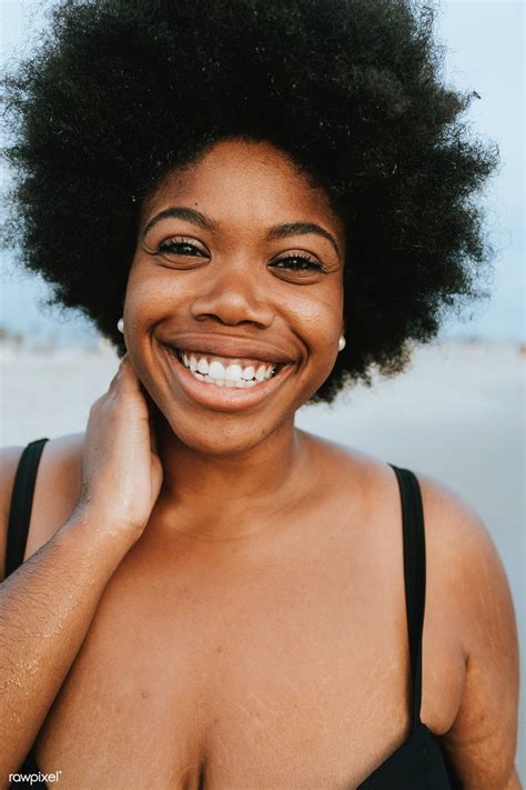 Beautiful plus size African American woman at the beach | premium image