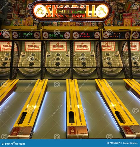 A Skee Ball Game Sits Vacant Late at Night Editorial Photography