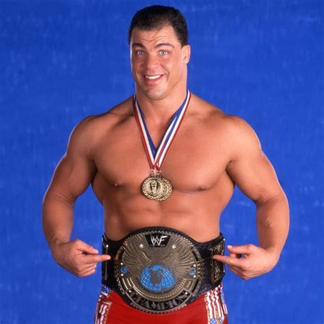 Download Kurt Angle Triumphantly Holding the WWF Championship Belt ...