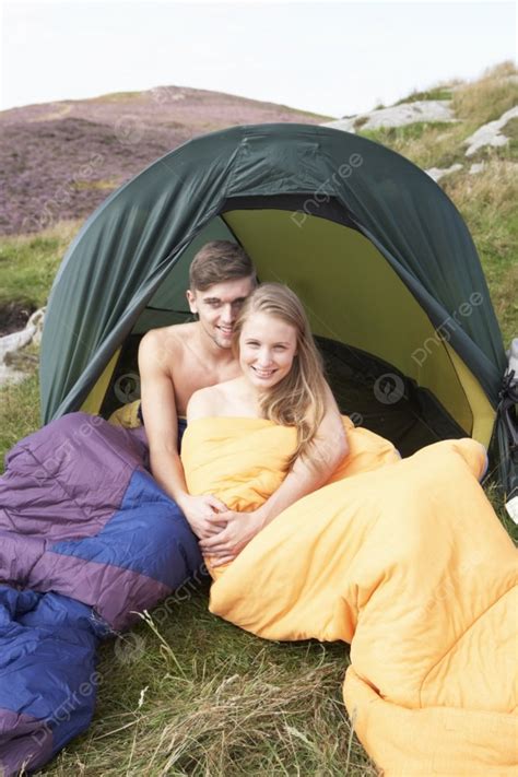 Young Couple On Camping Trip In Countryside Background, Teenage, Male
