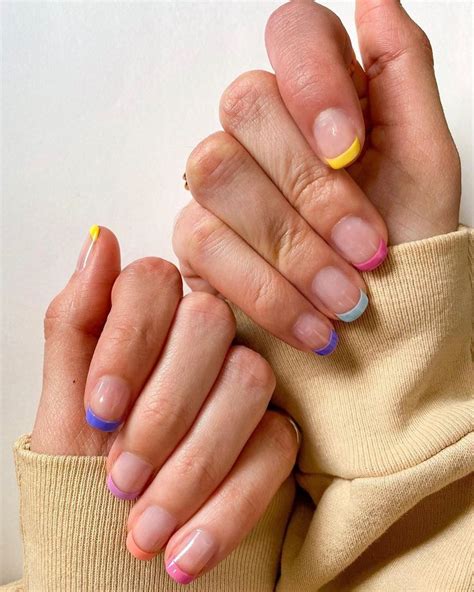 The rainbow French manicure is a new way to wear a classic French manicure. Find out why this ...