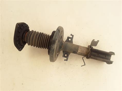 Used RENAULT Fluence Front shock absorber 543023532R