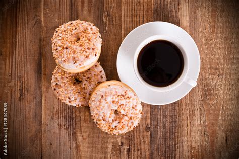 Sweet donuts with sprinkles. Stock Photo | Adobe Stock