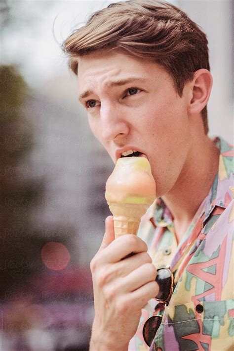 man eating ice cream  stocksy contributor cwp llc stocksy