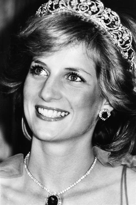 Princess Diana wearing a tiara and diamond necklace on an official
